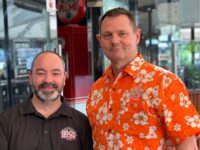 New Hog's Breath franchisee Paul Turner with Hog's CEO Ross Worth