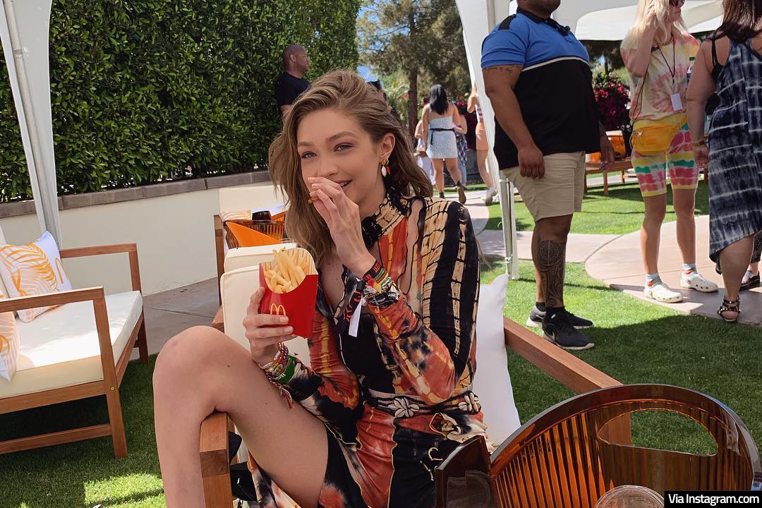 Gigi Hadid posing with McDonald's French Fries